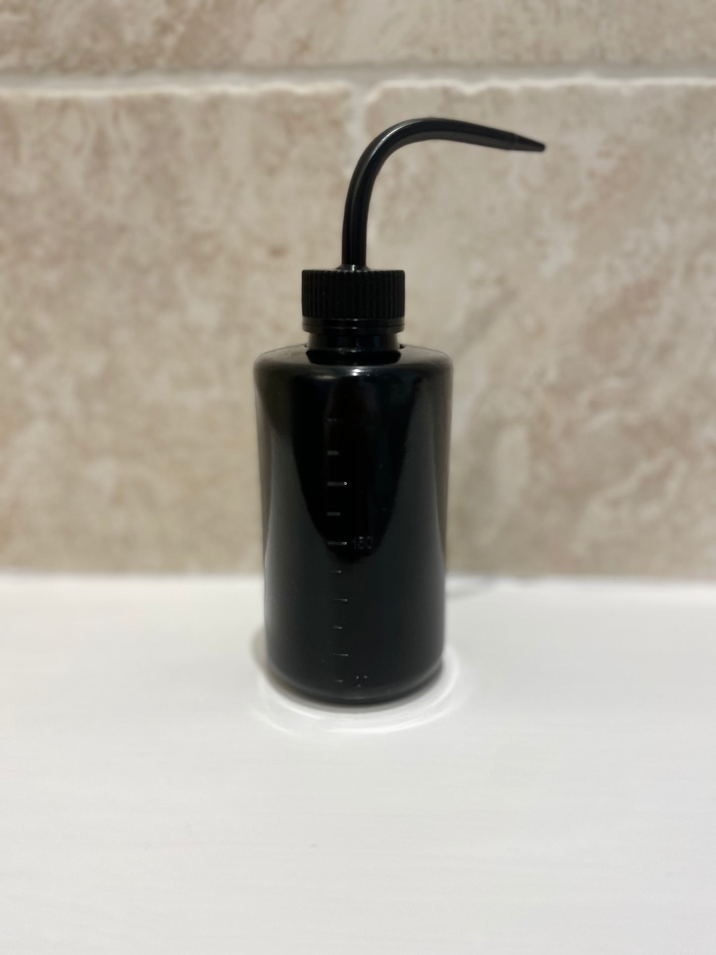 Eyelash extension cleaning bottle